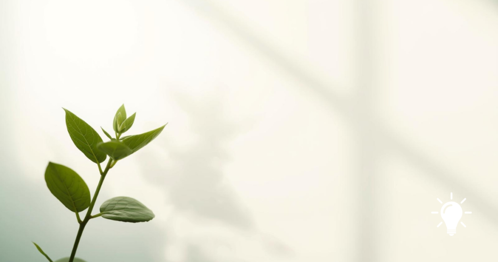 soft minimal botanical mood, gentle green leaf silhouette